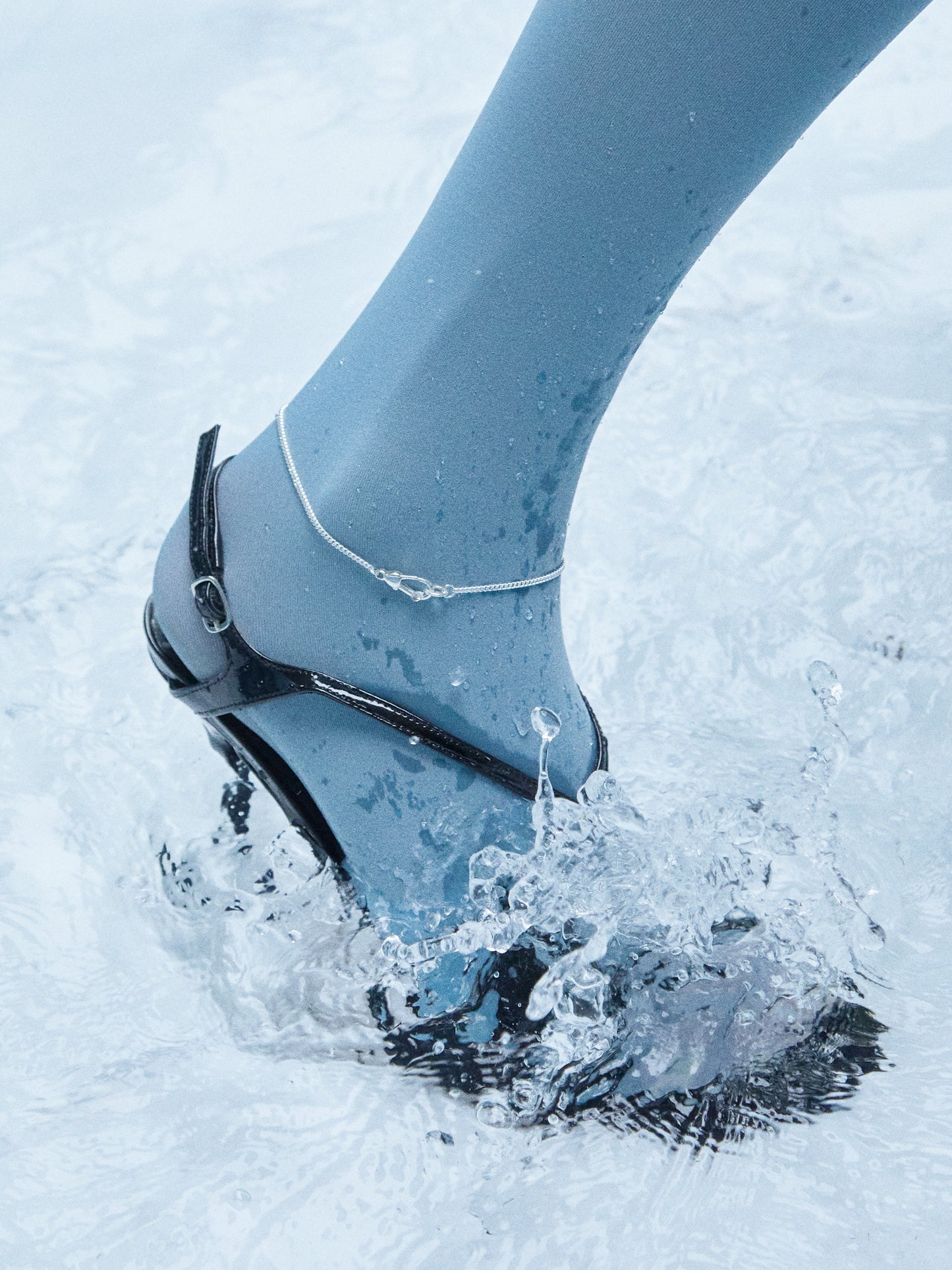 Model wearing Laura Lombardi Silver Via Anklet