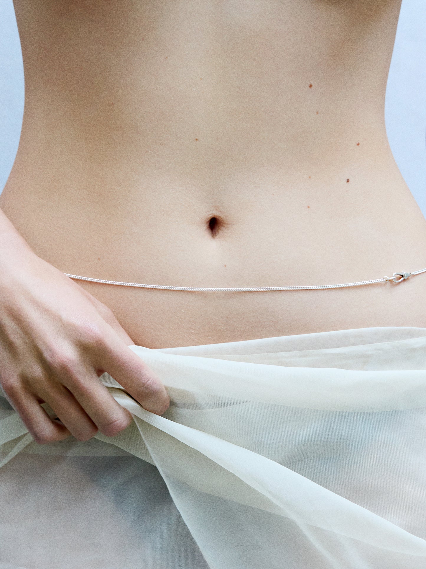 Model wearing Laura Lombardi Silver Via Waist Chain