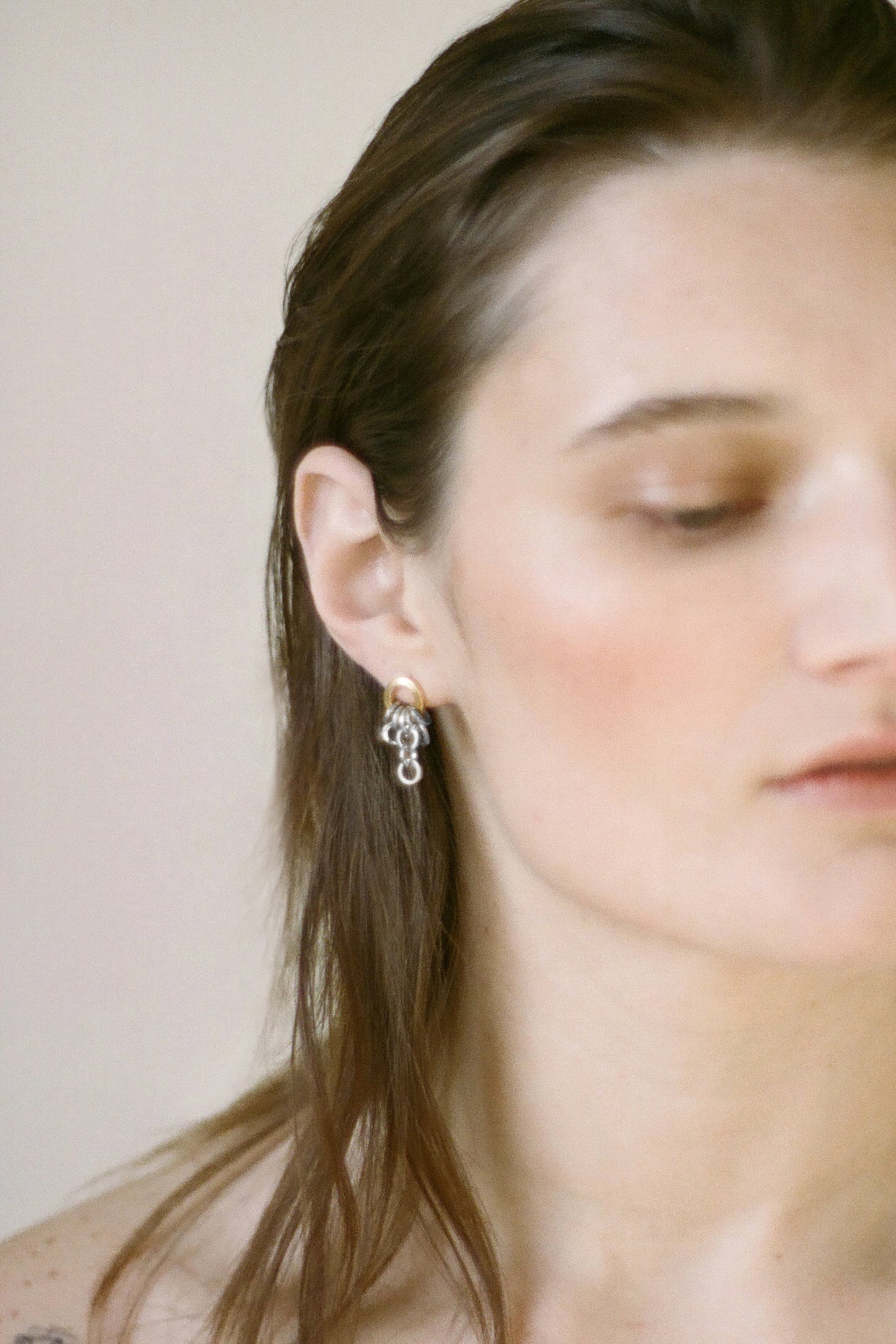 Model wearing Laura Lombardi Two Tone Colonna Earrings
