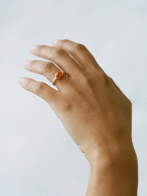 Model wearing Laura Lombardi yellow gold Goccia Ring