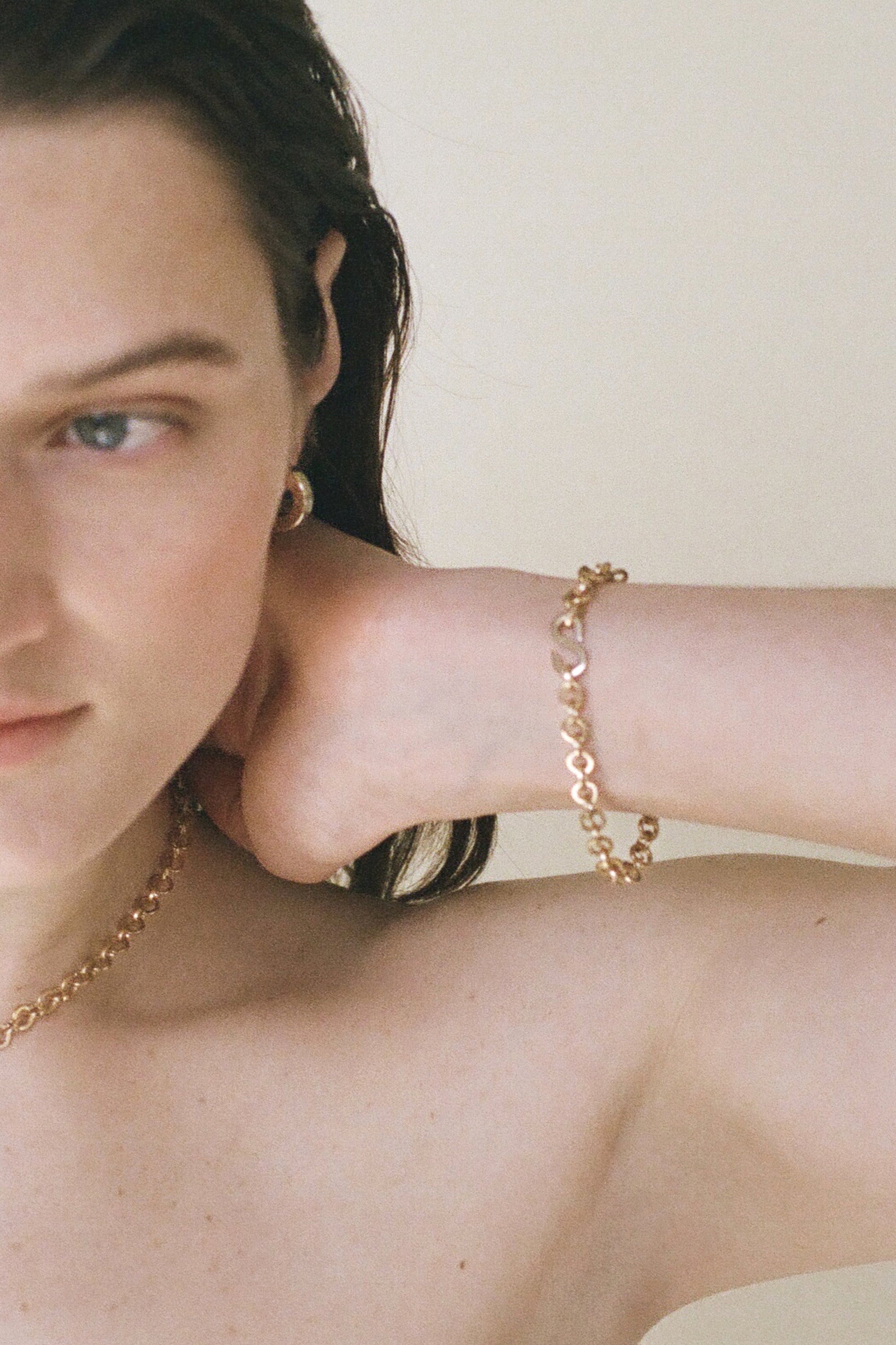 Model wearing Laura Lombardi gold Nuova Bracelet