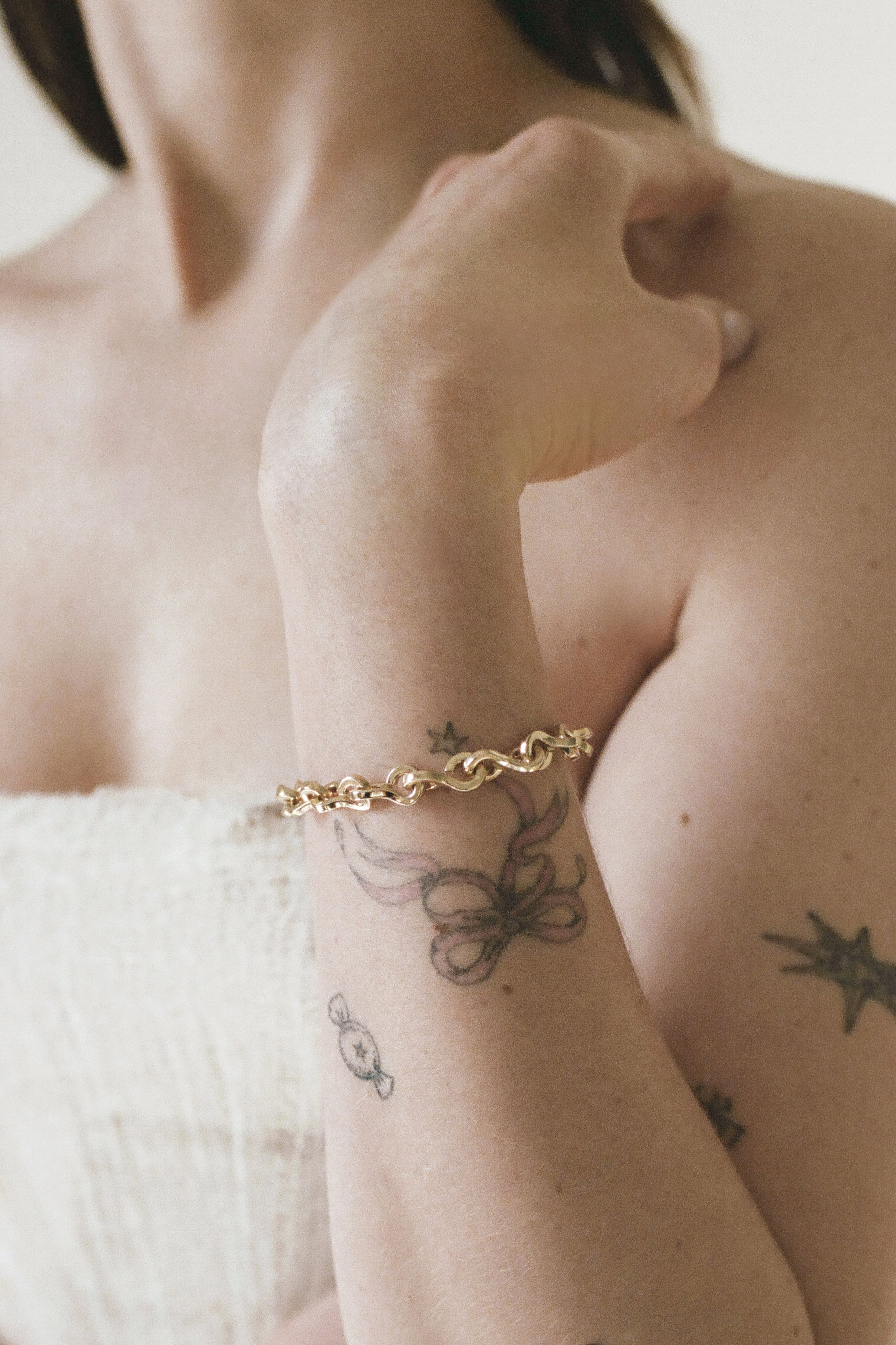 Model wearing Laura Lombardi gold Nuova Bracelet