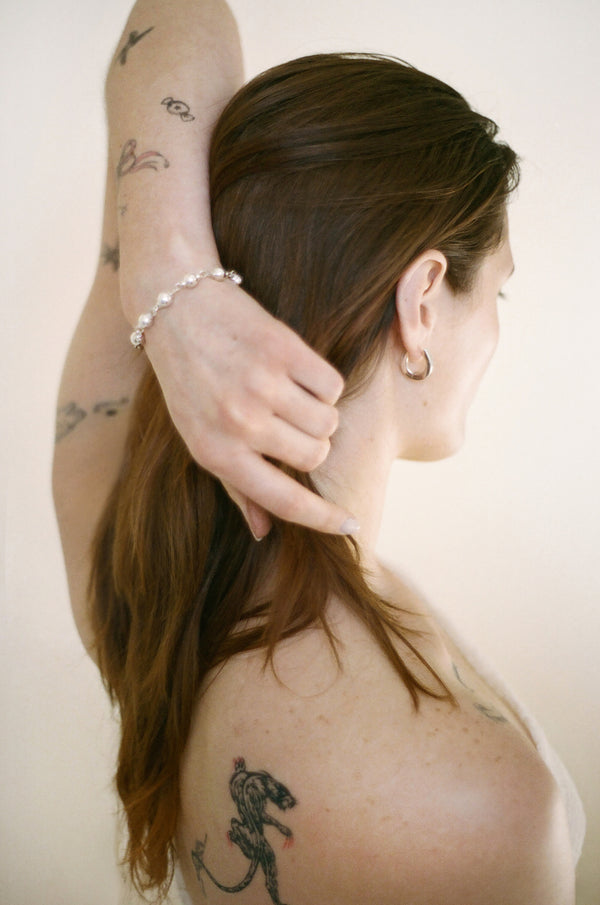 Model wearing Laura Lombardi Silver Suona Bracelet