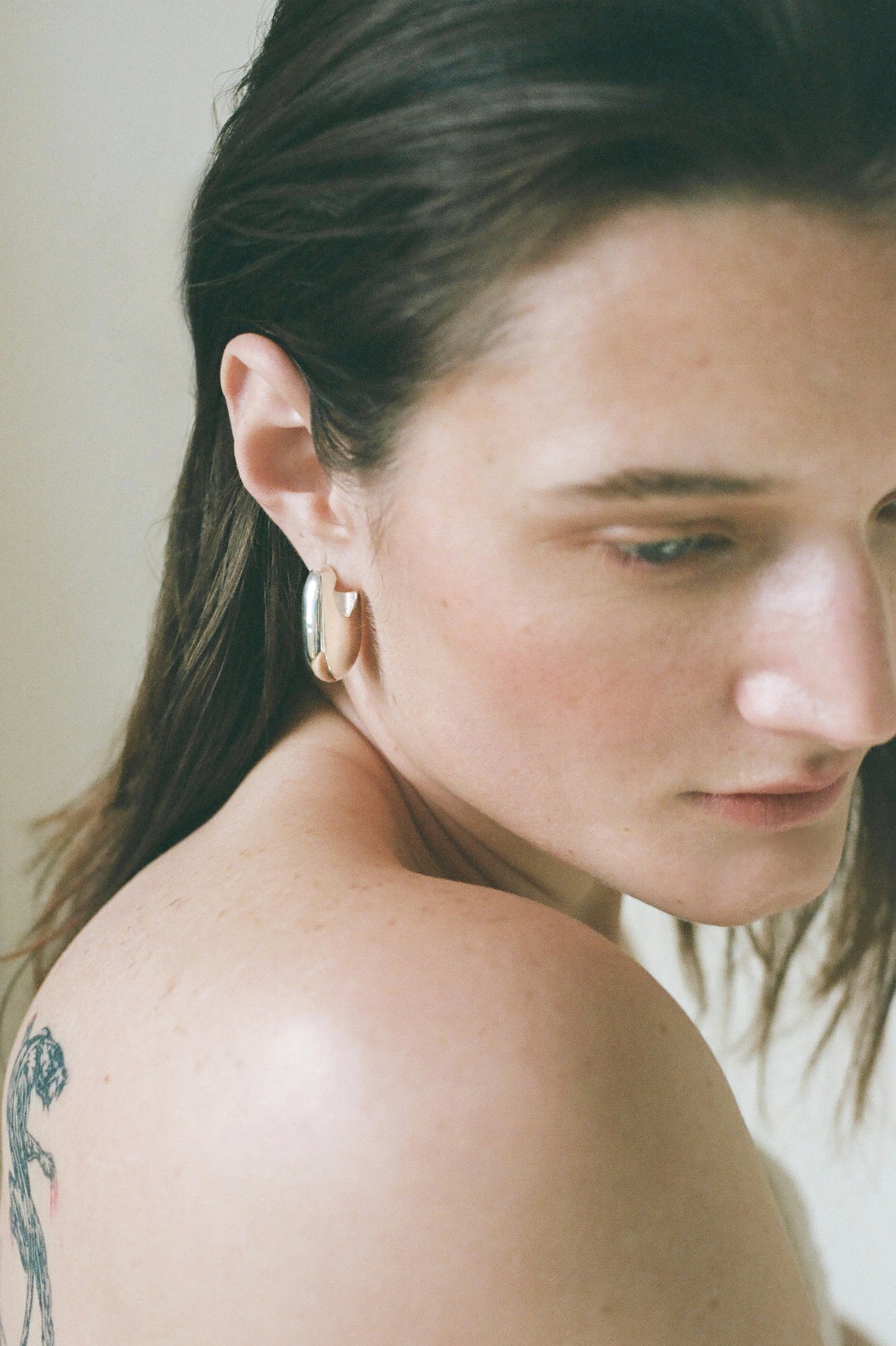 Model wearing Laura Lombardi Silver Vola Earrings