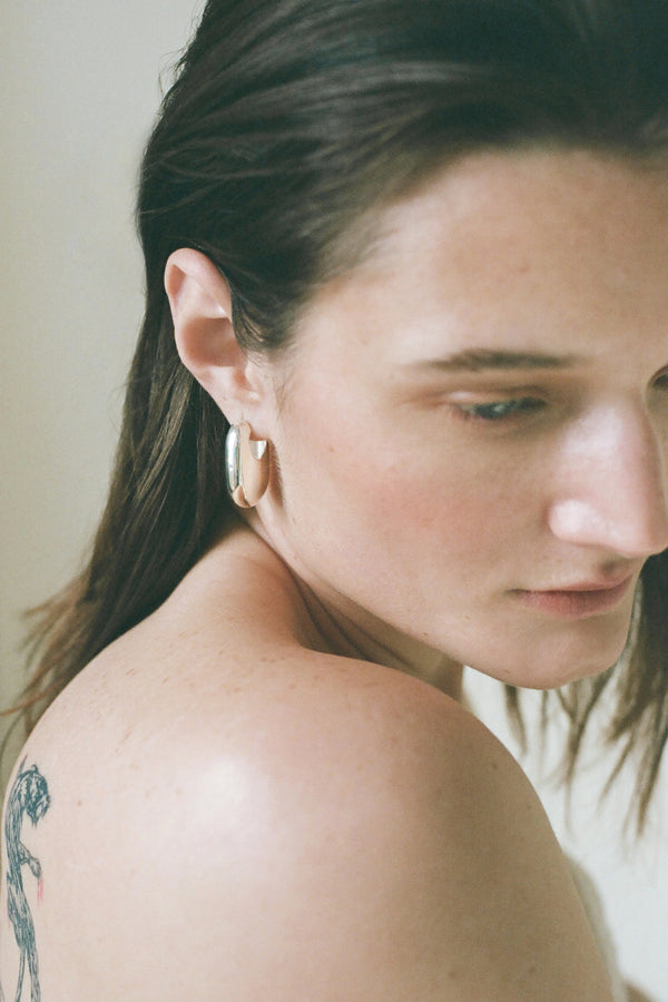 Model wearing Laura Lombardi Silver Vola Earrings