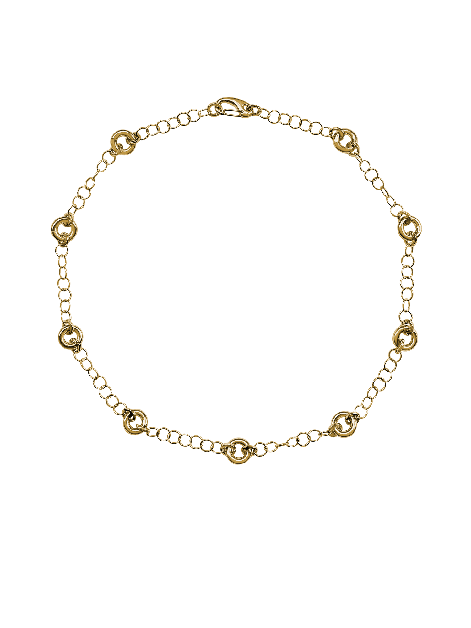 The Astra Necklace, a delicate cable chain with circular link accents in gold.