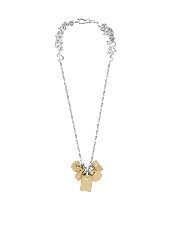 Necklace with gold and silver pendants on a sterling silver chain overtop a neutral background.