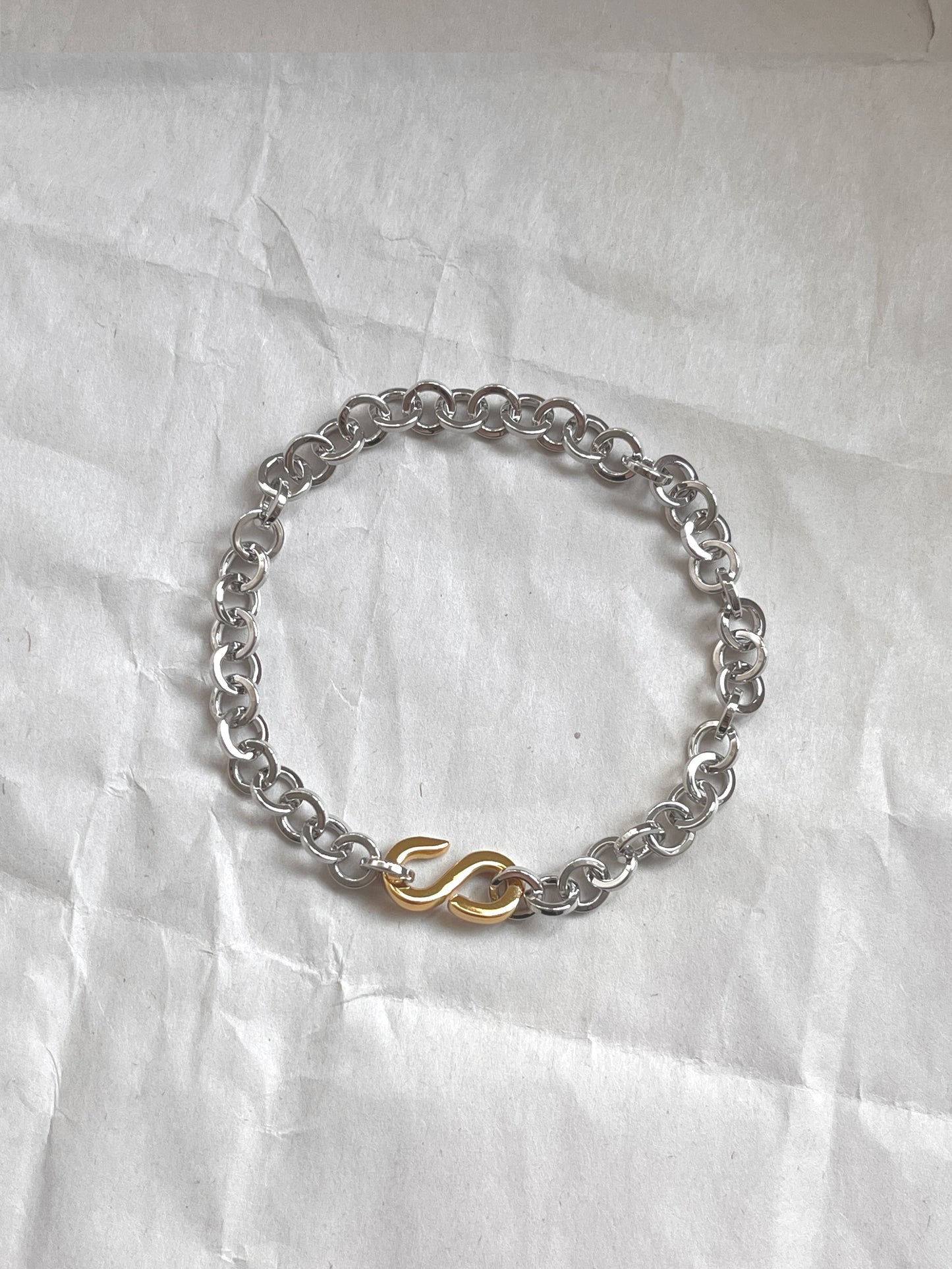 Laura Lombardi Two Tone Colonna chain Bracelet on white paper background.