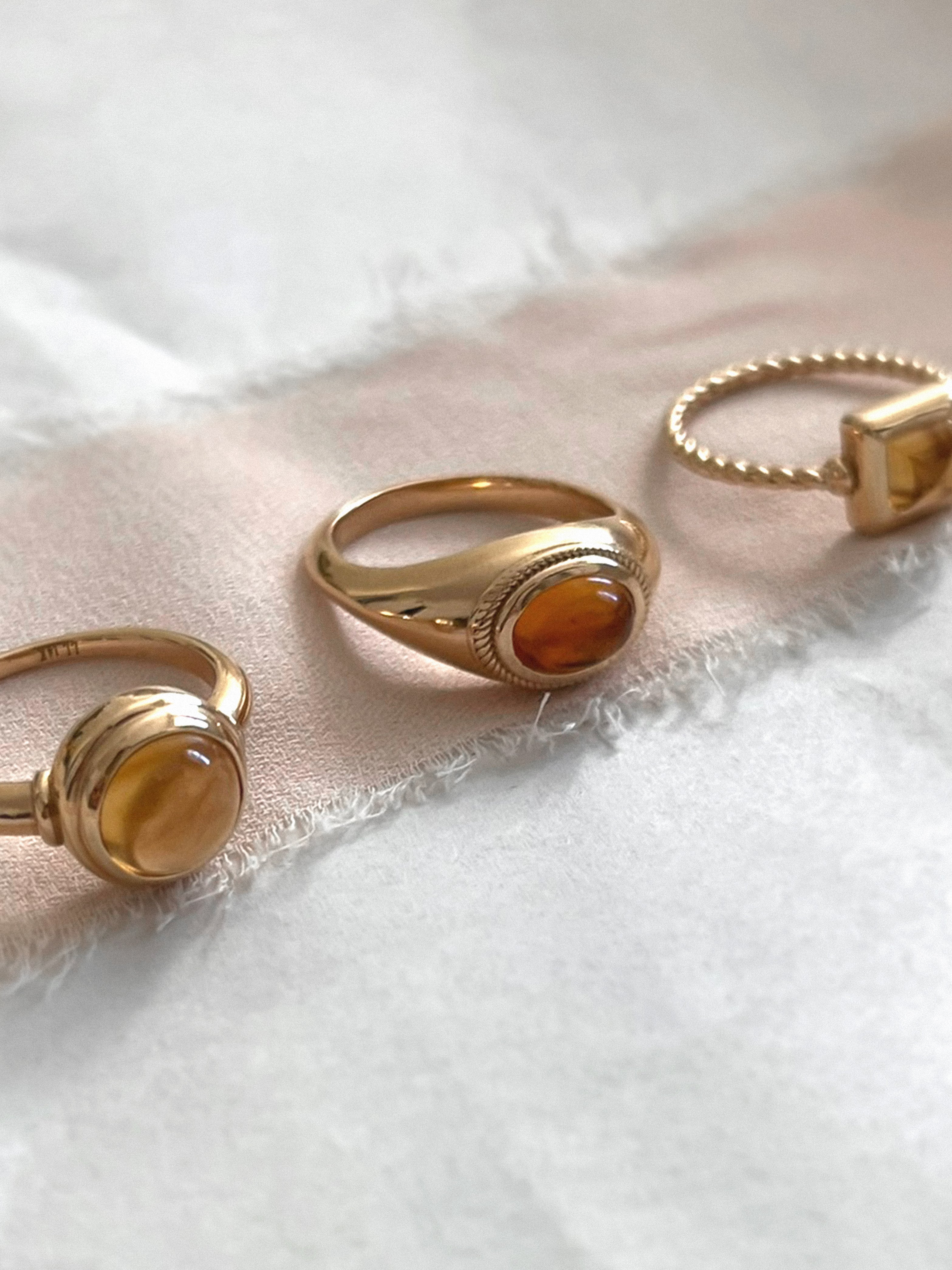Laura Lombardi gold Ginerva Ring, Sfera Ring and Quadro Ring with Citrine stone.
