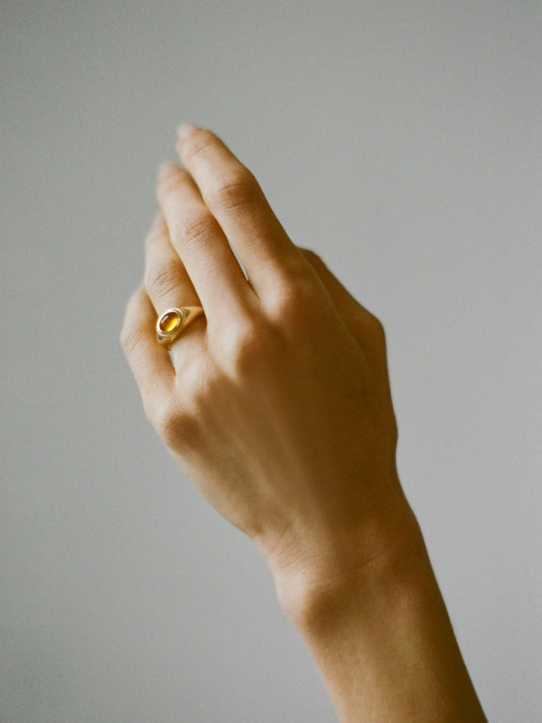 Model wearing Laura Lombardi gold Ginerva Ring with Citrine stone.