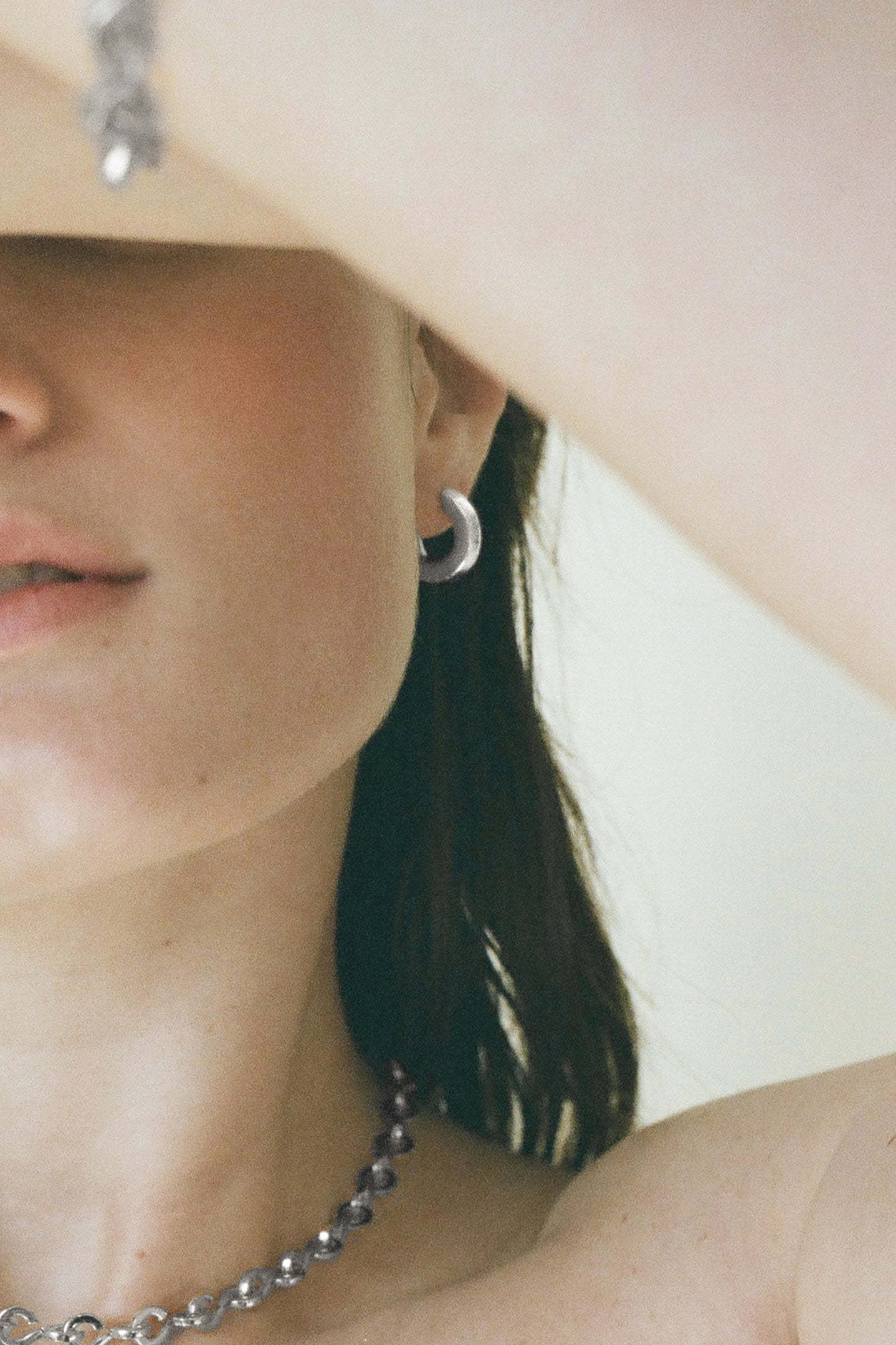 Model wearing Laura Lombardi Silver Persa Earrings