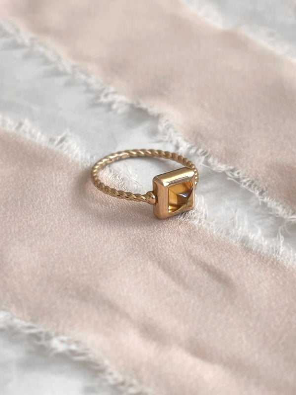Laura Lombardi gold Quadro Ring with yellow citrine stone.