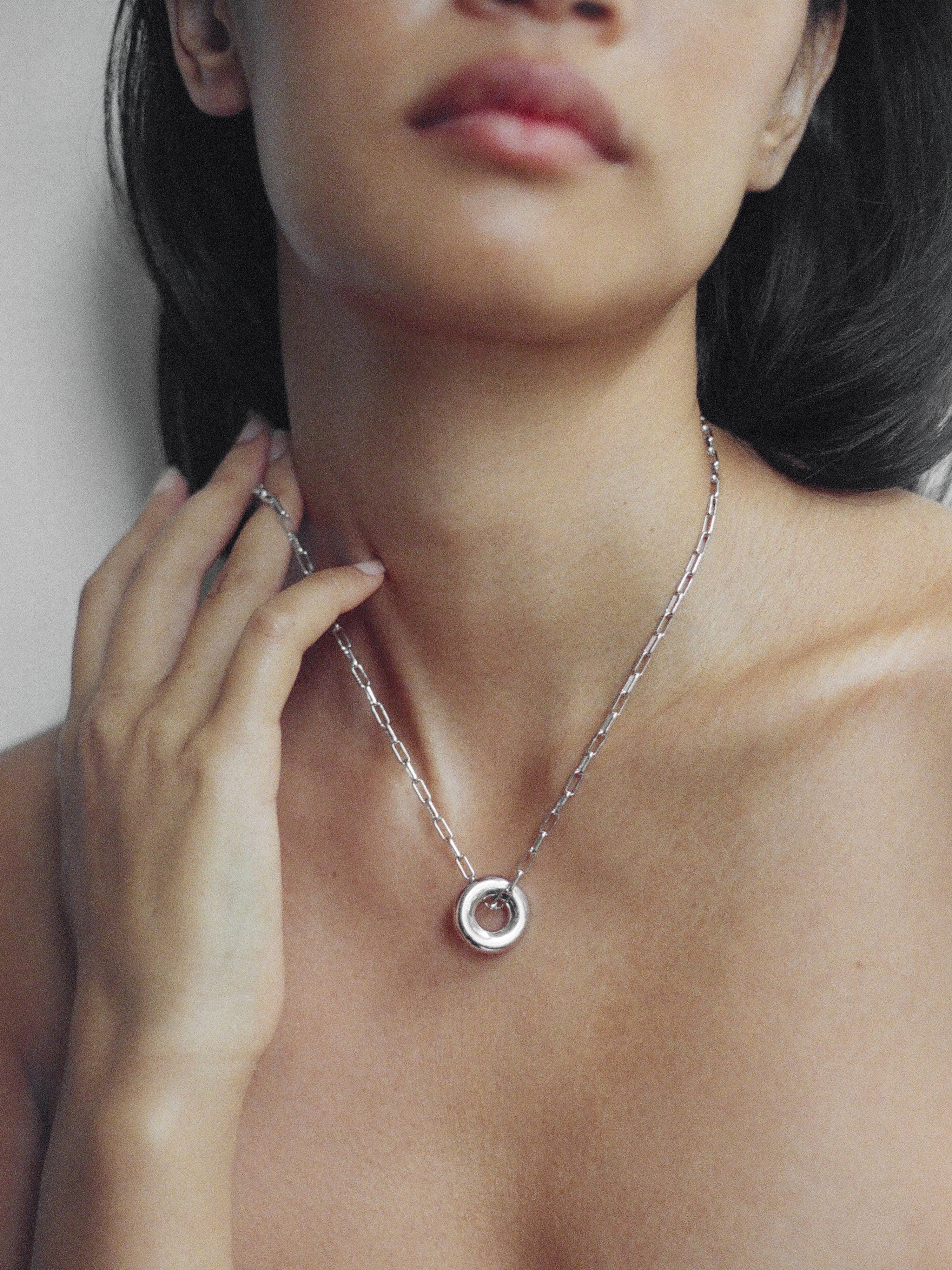 Silver Single Moneta necklace with a round pendant on a silver chain