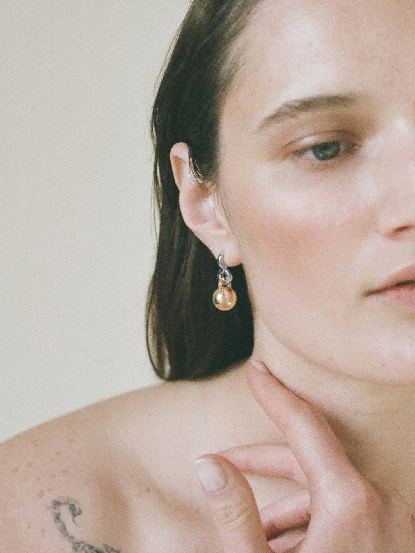 Model wearing Laura Lombardi Two Tone Gioca Earrings