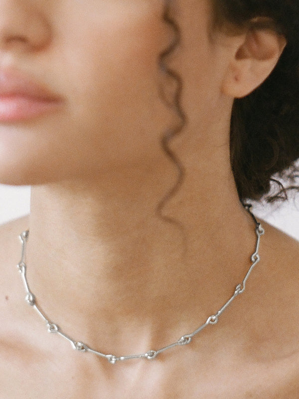 Model wearing Silver Treccia Necklace