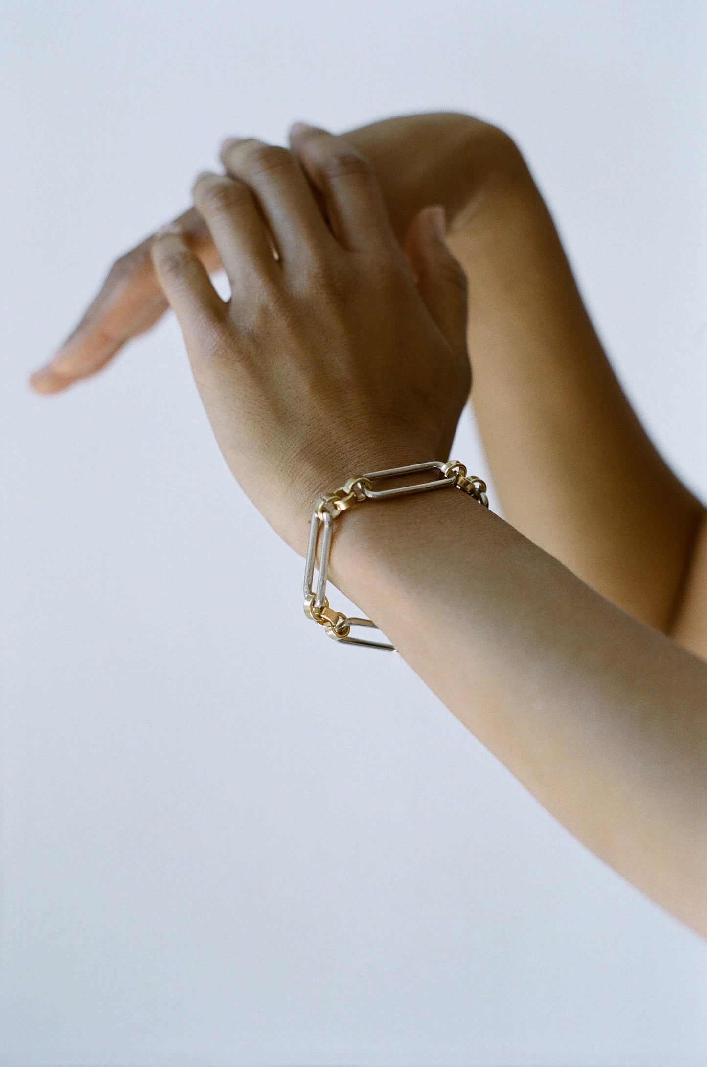 Model wearing Laura Lombardi Two Tone Stanza Bracelet.