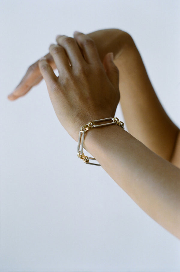 Model wearing Laura Lombardi Two Tone Stanza Bracelet.
